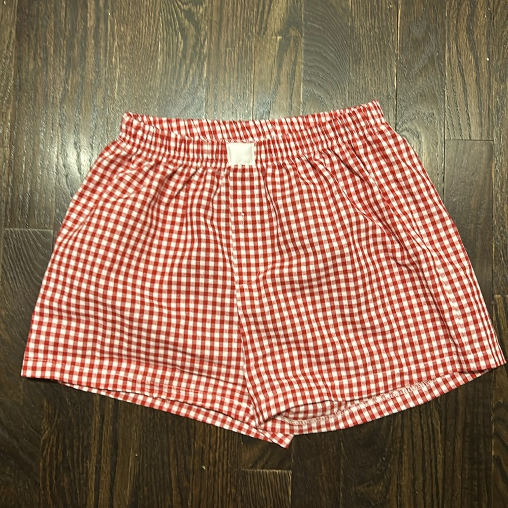 Red gingham boxer shorts. Ordered wrong size and didn’t return in time.